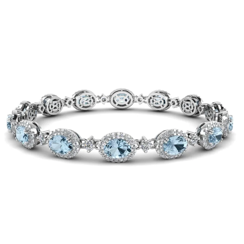 handcrafted bracelets for women -Oval Shape 9 Carat Aquamarine Center Featuring Diamond Halo Bracelet BRHAOCA