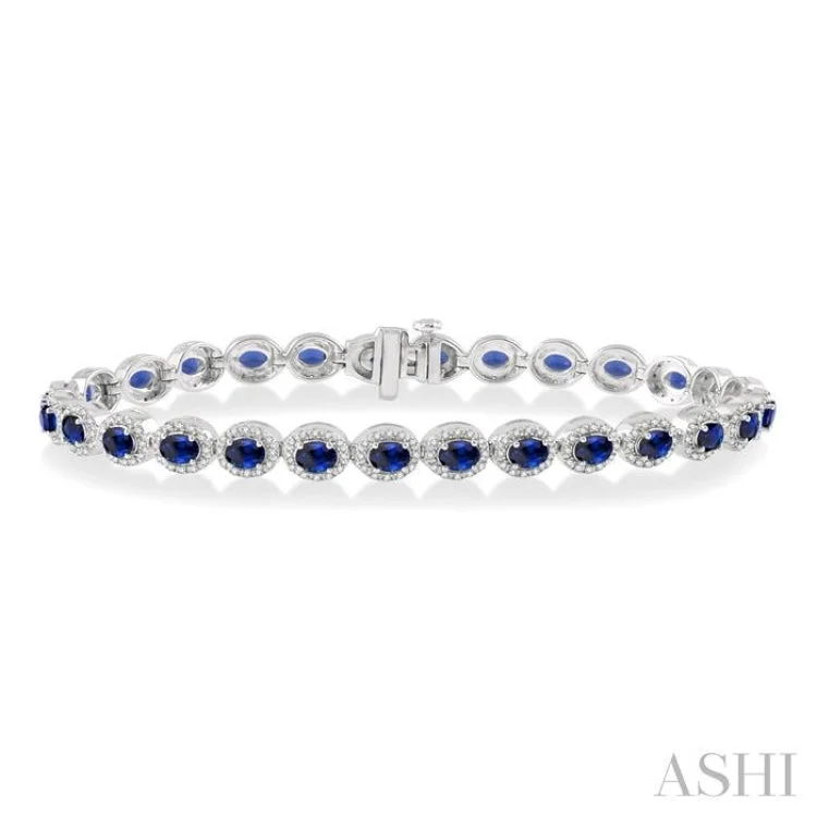 open heart bracelets for women -1 Ctw Round Cut Diamond & 4x3MM Oval Cut Sapphire Precious Bracelet in 14K White Gold