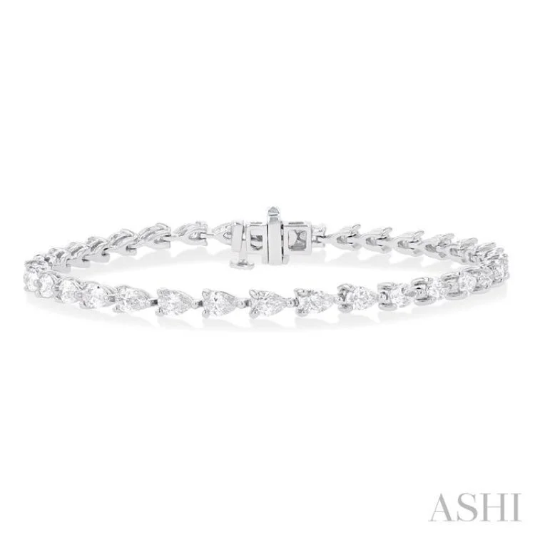 stackable bracelets for women -4 ctw East West Pear Cut Diamond Fashion Tennis Bracelet in 14K White Gold