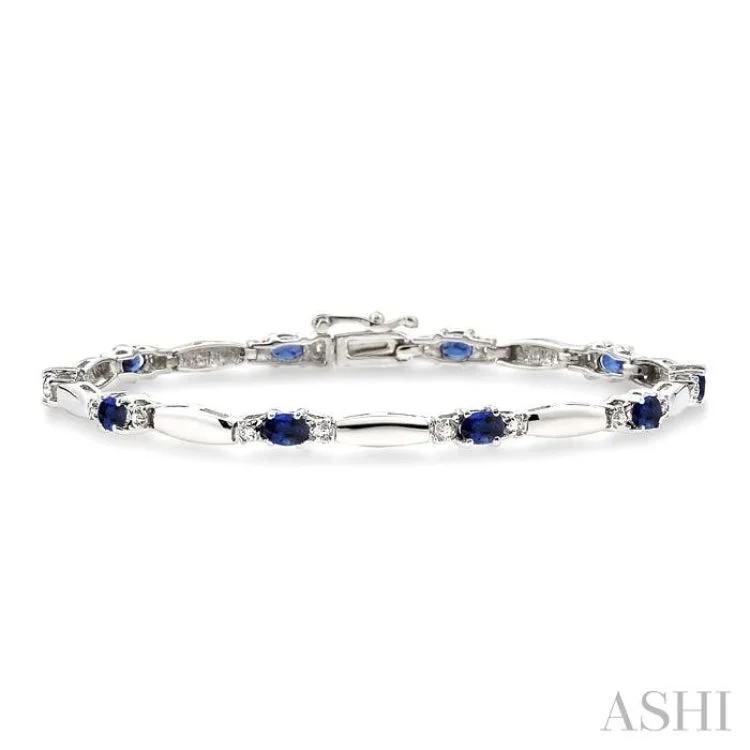 gemstone bracelets for women -1/10 Ctw Bar and Oval Mount Round Cut Diamond & 5x3MM Oval Cut Sapphire Precious Bracelet in 10K White Gold