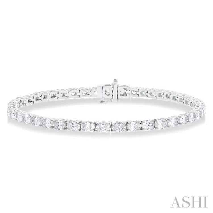 aquamarine bracelets for women -5 1/2 ctw East West Oval Cut Diamond Fashion Tennis bracelet in 14K White Gold