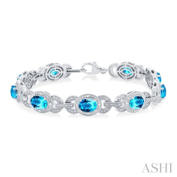 statement bracelets for women -1/10 ctw Oval Cut 7x5MM Blue Topaz and Round Cut Diamond Semi Precious Bracelet in Sterling Silver