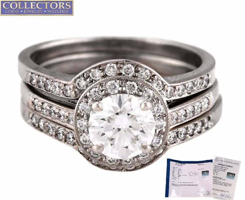 baguette engagement rings -Ladies Platinum 1.05ct E-F Round Brilliant Diamond Halo Engagement Ring Band Set